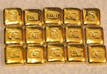 Vàng thế giới tăng khi đồng USD giảm